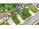 Aerial view of home, driveway, front porch, lawn, and surrounding mature trees at 119 Pickerel Blvd., Longs, SC 29568