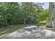Backyard and patio with views of surrounding trees and shrubs at 119 Pickerel Blvd., Longs, SC 29568