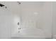 Bathroom featuring a soaking tub with white tile surround at 119 Pickerel Blvd., Longs, SC 29568