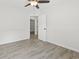 Bedroom with laminate flooring and view to hallway at 119 Pickerel Blvd., Longs, SC 29568