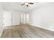 Bright, airy bedroom featuring neutral paint, walk-in closet, LVP flooring and white doors and trim at 119 Pickerel Blvd., Longs, SC 29568