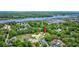Drone shot of a home surrounded by trees, near a waterway, blending serene nature with community living at 120 Triston Ct., Little River, SC 29566