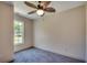 Bedroom with a ceiling fan, carpet, and window at 120 Triston Ct., Little River, SC 29566
