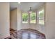 Sunny dining nook with abundant natural light and wood-look flooring at 120 Triston Ct., Little River, SC 29566
