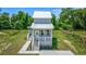 Inviting home with a charming front porch, fresh exterior paint, and a cozy curb appeal at 120 Triston Ct., Little River, SC 29566