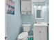 Classic bathroom with a toilet, vanity, mirror, and storage at 1210 N Waccamaw Dr. # 1008, Garden City Beach, SC 29576
