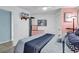 Relaxing bedroom with a light color scheme and wood flooring at 1210 N Waccamaw Dr. # 1008, Garden City Beach, SC 29576