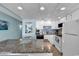 Kitchen featuring granite countertops and white appliances at 1210 N Waccamaw Dr. # 1008, Garden City Beach, SC 29576