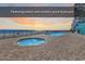 Outdoor hot tubs with ocean view at sunset at 1210 N Waccamaw Dr. # 1008, Garden City Beach, SC 29576