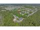 Expansive aerial shot showcasing the townhome community nestled among mature trees and offering a serene environment at 1249 Shoebridge Dr. # 1249, Myrtle Beach, SC 29579