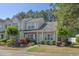 Charming townhome exterior with well-maintained landscaping, lovely flowers, and welcoming curb appeal at 1249 Shoebridge Dr. # 1249, Myrtle Beach, SC 29579