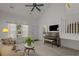 Bright living room featuring vaulted ceilings, a piano, and ample seating at 1249 Shoebridge Dr. # 1249, Myrtle Beach, SC 29579