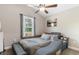Vaulted ceiling bedroom with a unique gray bed and stylish gray bedding set at 1396 Highway 129, Galivants Ferry, SC 29544
