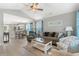 Open-concept living room featuring stylish furnishings, a ceiling fan, and a view of the dining area at 1396 Highway 129, Galivants Ferry, SC 29544