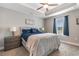 Relaxing main bedroom with tray ceiling, comfortable bedding, and soft natural light at 1396 Highway 129, Galivants Ferry, SC 29544
