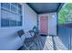 Charming balcony with bistro set offers a cozy outdoor space for relaxation at 1500 Cenith Dr. # D 103, North Myrtle Beach, SC 29582