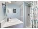 Bathroom vanity and shower featuring fish-themed shower curtain at 1500 Cenith Dr. # D 103, North Myrtle Beach, SC 29582