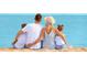 Back view of a Gathering sitting on the sand, enjoying the peaceful view of the light blue ocean at 1500 Cenith Dr. # D 103, North Myrtle Beach, SC 29582