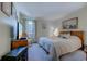 Comfortable bedroom featuring calming decor and a cozy quilt-covered bed with nautical theme at 1500 Cenith Dr. # D 103, North Myrtle Beach, SC 29582