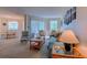 Open-concept living room flowing into a dining area with plenty of natural light at 1500 Cenith Dr. # D 103, North Myrtle Beach, SC 29582