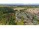 Aerial view showcasing the neighborhood, mature trees, and serene location at 1505 Bramber Pl., Conway, SC 29527