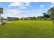 Expansive backyard featuring lush green grass and a serene, open space at 1505 Bramber Pl., Conway, SC 29527