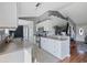 Spacious kitchen view with white cabinets, stainless steel appliances, and an open design to other rooms at 1505 Bramber Pl., Conway, SC 29527