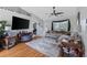 Comfortable living room with vaulted ceilings, hardwood floors, and a view into other rooms at 1505 Bramber Pl., Conway, SC 29527
