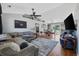 Spacious living room featuring vaulted ceilings, hardwood floors, and an open floor plan at 1505 Bramber Pl., Conway, SC 29527