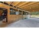 Well-maintained horse stalls with wooden construction and ample space at 151 Saddle Dr., Loris, SC 29569