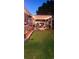 Outdoor living space featuring a stone patio, pergola with string lights, and a fire pit for entertaining at 1717 Perdiz Covey Ct., Myrtle Beach, SC 29588