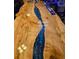Close-up of a bar with a custom-made wooden counter with a river of blue epoxy running through it at 1717 Perdiz Covey Ct., Myrtle Beach, SC 29588