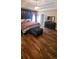 Warm and inviting bedroom with a comfortable bed, dresser, and ample natural light at 1717 Perdiz Covey Ct., Myrtle Beach, SC 29588