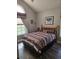 Cozy bedroom with a large window and vaulted ceilings at 1717 Perdiz Covey Ct., Myrtle Beach, SC 29588