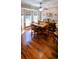 Dining room with hardwood floors, ceiling fan, decorative lighting and furniture at 1717 Perdiz Covey Ct., Myrtle Beach, SC 29588