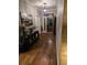 Inviting foyer with hardwood floors, console table, decorative lighting, and a view to the outdoors at 1717 Perdiz Covey Ct., Myrtle Beach, SC 29588