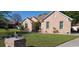 Charming home with brick exterior, manicured lawn, and well-maintained landscaping at 1717 Perdiz Covey Ct., Myrtle Beach, SC 29588