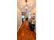 Elegant hallway with hardwood floors, stylish lighting, and decorative accents at 1717 Perdiz Covey Ct., Myrtle Beach, SC 29588