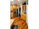 Well-lit kitchen with stainless steel refrigerator, modern cabinets and countertops at 1717 Perdiz Covey Ct., Myrtle Beach, SC 29588