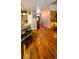 Inviting living area with wood floors, flowing seamlessly into the open kitchen at 1717 Perdiz Covey Ct., Myrtle Beach, SC 29588