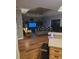 Comfortable living room with tray ceilings, ceiling fan, hardwood floors, and neutral color palette at 1717 Perdiz Covey Ct., Myrtle Beach, SC 29588