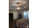 Bedroom with a ceiling fan, sliding glass door and view of the outdoor living space at 1717 Perdiz Covey Ct., Myrtle Beach, SC 29588