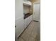 Features a mud room with cabinets, counter space, tile backsplash and flooring at 1717 Perdiz Covey Ct., Myrtle Beach, SC 29588