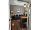 Home office with hardwood floors, ceiling fan, a desk, comfortable seating, and neutral color palette at 1717 Perdiz Covey Ct., Myrtle Beach, SC 29588