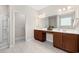 Bathroom featuring double sinks and vanity, and a walk-in glass shower at 179 Hyacinth Loop, Murrells Inlet, SC 29576