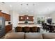 Open kitchen featuring a large island with seating and modern appliances next to the dining area at 179 Hyacinth Loop, Murrells Inlet, SC 29576
