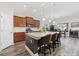 Spacious kitchen island with granite countertops, stainless steel appliances, and stylish pendant lighting at 179 Hyacinth Loop, Murrells Inlet, SC 29576