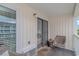 Cozy outdoor balcony with comfortable wicker seating, perfect for relaxing at 191 Maison Dr. # B-323, Myrtle Beach, SC 29572