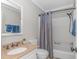 Bathroom featuring a vanity with a stone countertop and a shower with a curtain at 191 Maison Dr. # B-323, Myrtle Beach, SC 29572