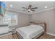 Bedroom with a bed, ceiling fan, and a window with blinds at 191 Maison Dr. # B-323, Myrtle Beach, SC 29572